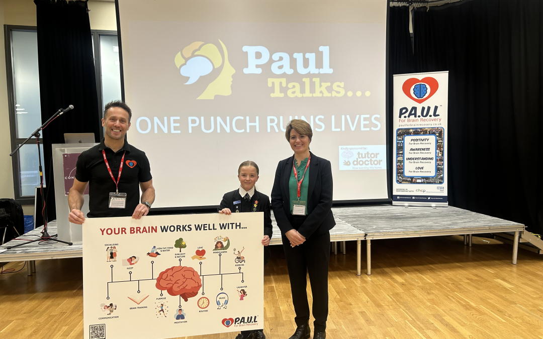 Emma Hardy MP, Paul Spence and pupil holding a 'Yor Brain Works Well With...' board at the launch of this initiative at Archbishop Sentamu