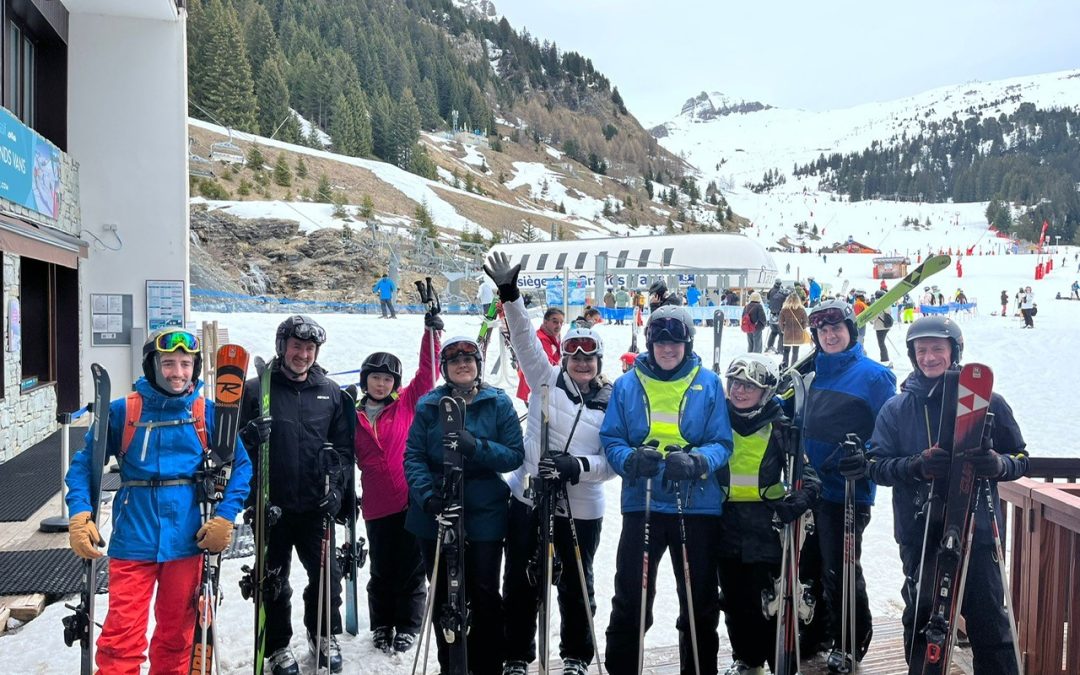 Kev with family and friends on a ski trip