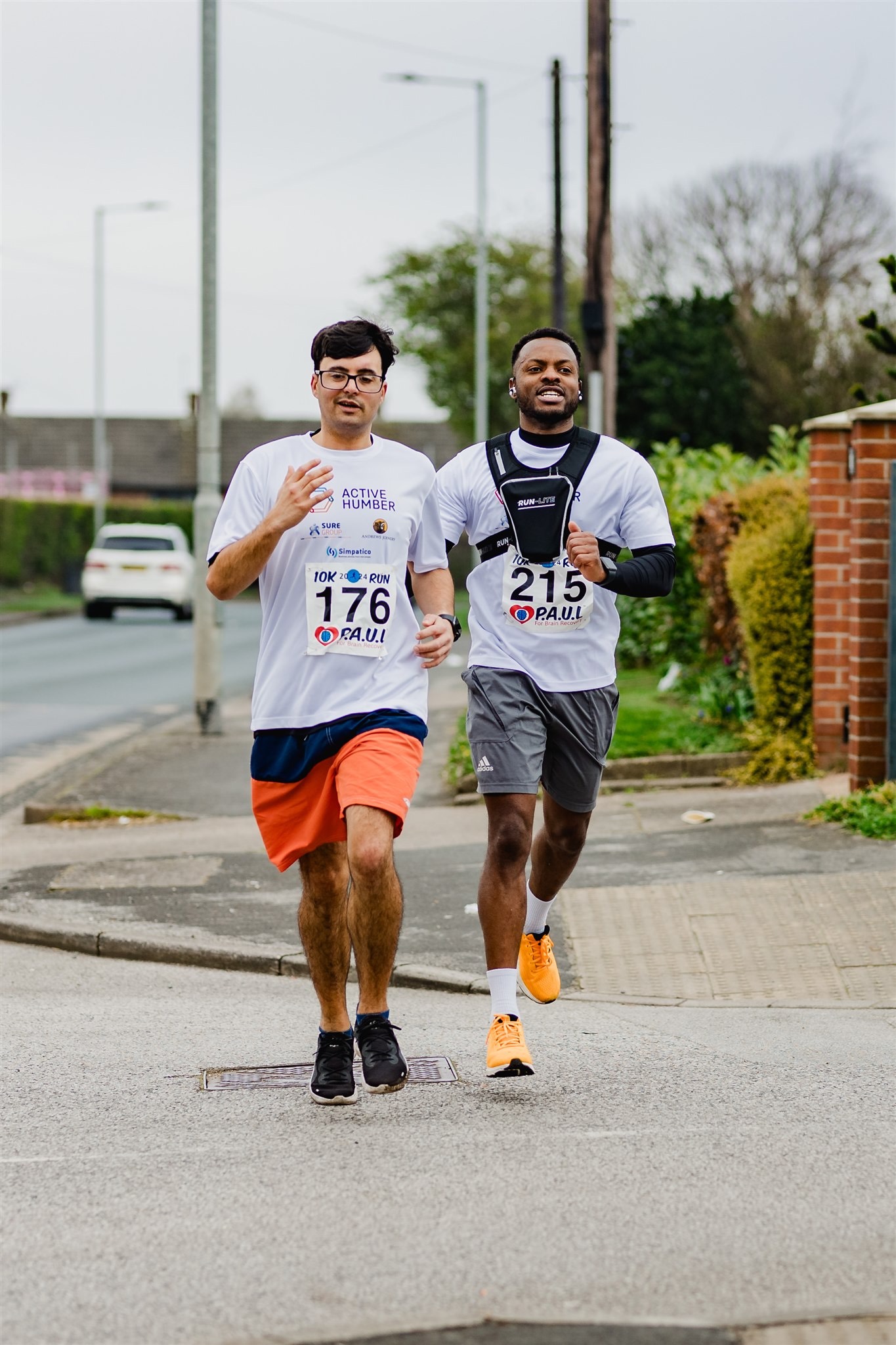 Georgio and support worker running P.A.U.L For Brain Recovery's 10K 2024
